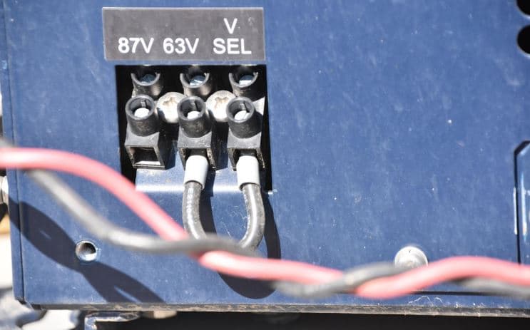 Energy storage system installation with battery terminals and wiring